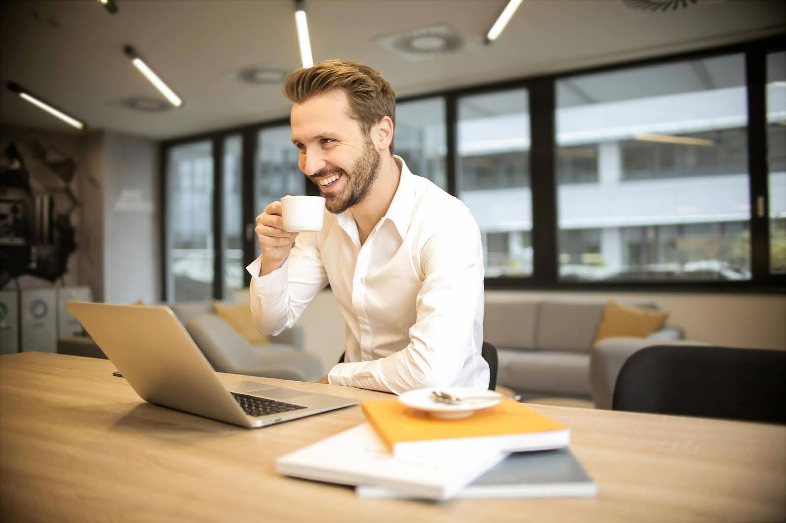 man sitting at laptop, financial advisor, self-employed retirement plans