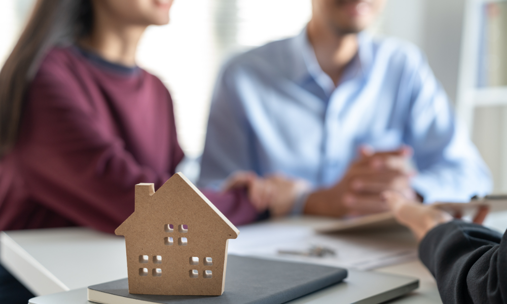 Couple meeting with advisor about estate plan