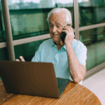 Elder reviewing retirement resolutions together at home, planning for a secure and fulfilling year