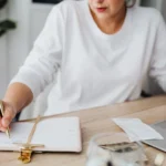 a lady in doing a planning on her desk