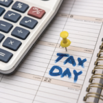 Financial advisor reviewing tax extension options, IRS Form 4868, and filing deadline strategy with a client during tax season.