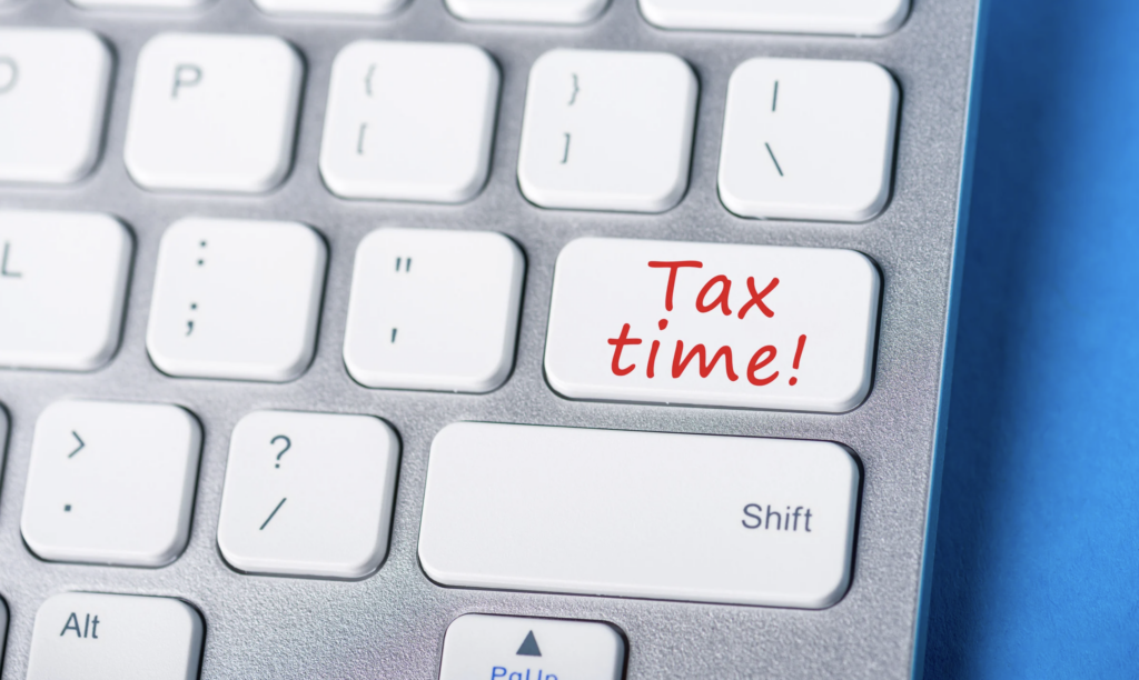 Keyboard key with “Tax time” text highlighting tax season reminder