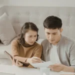 couples checking document