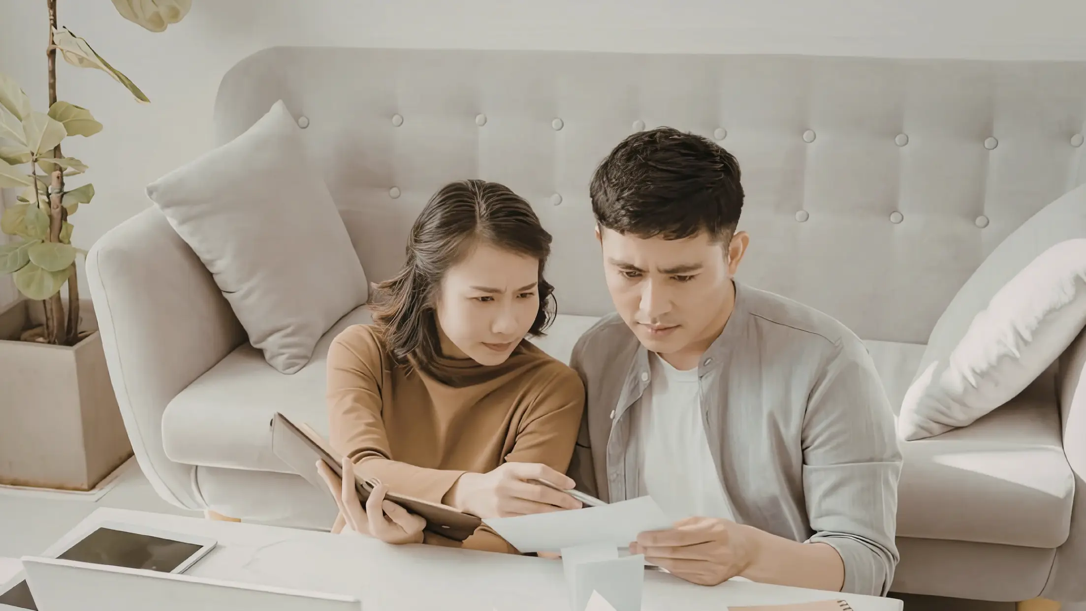 couples checking document